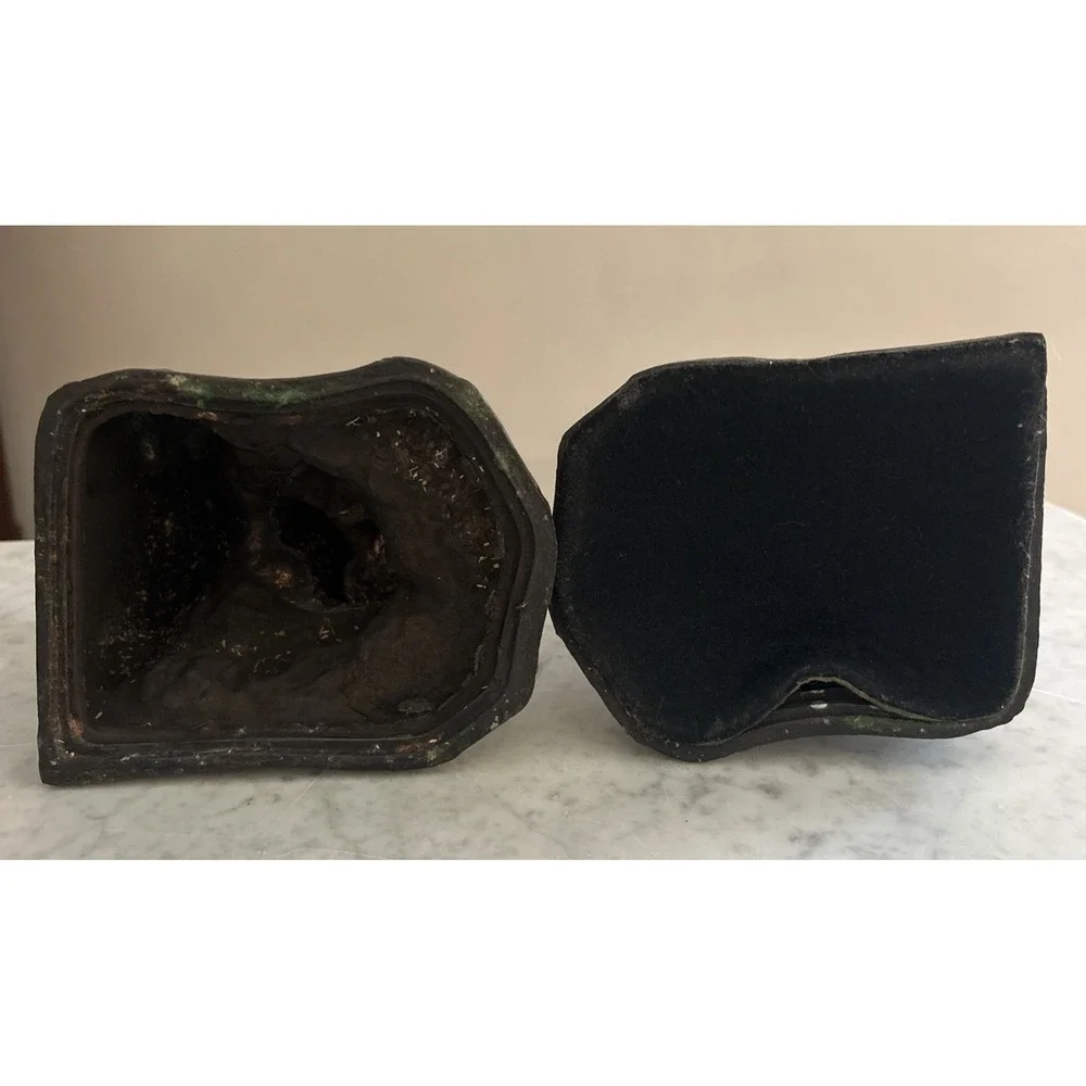 Antique Meal metal cast Indian bookends. Good condition.